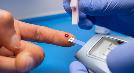 closeup-shot-doctor-with-rubber-gloves-taking-blood-test-from-patient 1